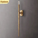 Axyaa Brass Crystal LED Wall Lamp for Home Decor.