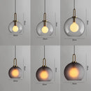 Axyaa Smoke Grey Glass Globe Pendant Light for Industrial Style Living Spaces