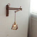 Axyaa Vintage Brass LED Wall Lamp with Amber Glass, Rotating Design