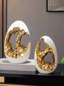 Axyaa Luxury Gold & Silver Egg Decorations: Modern, High-End Décor for Living Rooms & Offices.