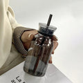 Axyaa Large Glass Water Bottle with Straw, 2 Lids, Clear, Leakproof, Kawaii Eco-Friendly Design