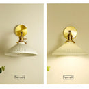 Axyaa Retro Ceramic Brass Wall Sconce Lamp with Adjustable Light Direction