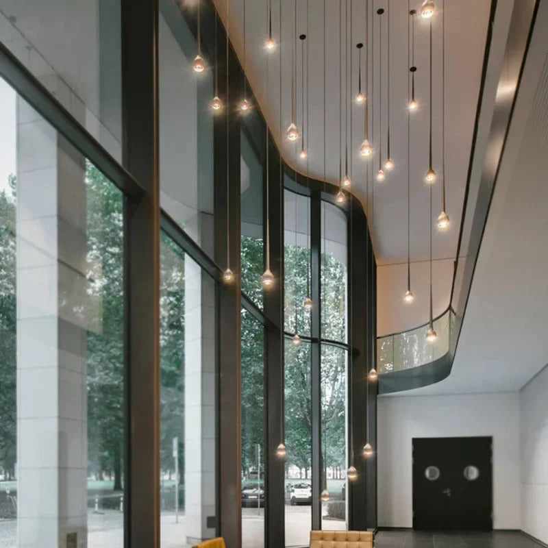 Axyaa Water Drop Pendant Light: Modern Luxury for Staircase, Bar, and Restaurant
