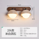 Axyaa Yellow Cave Stone Wall Light: Japanese Style, Rotatable, Bedroom Bedside Lamp