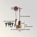 Axyaa Black Travertine Stone LED Wall Lamp for Wabi Sabi Living Room Lighting.
