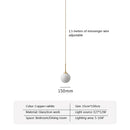Axyaa Nordic Brass Bedside Pendant Lamp - Modern Glass Sphere for Bedroom & Bar Counter.