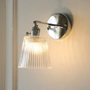 Axyaa Clear Glass Iron Wall Lamp with Pull Chain Switch & Rotatable Up Down Light