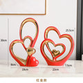 Axyaa Gold Ceramic Ornaments for Stylish Home Decor - Set of 2