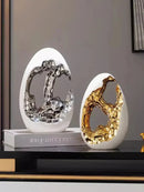 Axyaa Luxury Gold & Silver Egg Decorations: Modern, High-End Décor for Living Rooms & Offices.