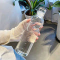 Axyaa 500ml Glass Water Bottle with PU Cup Holder and Time Marker