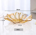 Axyaa Melon Seed & Fruit Plate Set on Crystal Glass Coffee Table