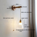 Axyaa Wabi Sabi Clear Glass LED Wall Lamp with Vintage Brass Socket