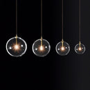 Axyaa Modern Simple Metal Pendant Lights Clear Glass Globe G4 Hanging Lamps