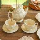 Axyaa Ceramic Gold Painted Tea Cup Set glamorizes afternoon tea styling
