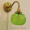 Axyaa Brass Wall Sconce with Multicolor Glass Globe – Modern Bedroom Wall Light