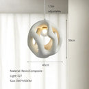 Axyaa Resin Pendant Lamp: Wabi-Sabi Design, LED Indoor Hanging Light for Home Decor.