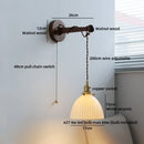Axyaa Ceramic Round LED Wall Lamp Pull Chain Switch Bedroom Reading Light