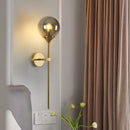 Axyaa Glass Globe Wall Sconce: Elegant Brass LED Bedside Lamp for Bedroom & Study