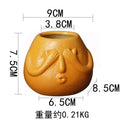 Ceramic Human Face Flowerpot by Axyaa