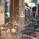 Axyaa Cute Ball Chandelier: Creative Spherical Pendant Light for Bedroom, Restaurant, and Shop.