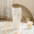 Axyaa Light Luxury Ceramic White Relief Flower Vase with Dried Flowers