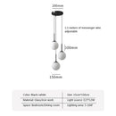 Axyaa Nordic Brass Bedside Pendant Lamp - Modern Glass Sphere for Bedroom & Bar Counter.