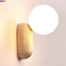 Axyaa Wabi Sabi LED Wall Light Yellow Travertine Stone White Glass Ball