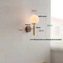 Axyaa Globe White Glass LED Wall Sconce Copper Base Mirror Light