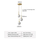 Axyaa Nordic Brass Bedside Pendant Lamp - Modern Glass Sphere for Bedroom & Bar Counter.