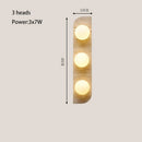 Modern Travertine Stone Wall Sconce Light with Glass Ball for Bedroom Living Room by Axyaa