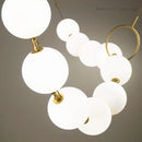 Axyaa Luxury Pendant Light: Necklace Shape Chandelier with White Glass Ball