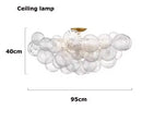 Axyaa Glass Bubble Chandelier: Modern Round Pendant Lamp for Living Room, Kitchen, Hotel.