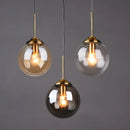 Axyaa Vintage Glass Globe Pendant Light Trio in Clear, Smoke Gray, or Amber