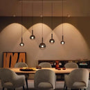 Axyaa Minimalist Glass Headboard Pendant Lamp for Luxury Bedroom