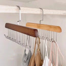 Axyaa 8-Hook Wooden Clothes Hanger for Home Storage and Organization.