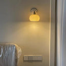 Axyaa Brass Ceramic Wall Lamp for Luxurious Bedroom Atmosphere