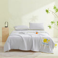 Axyaa Ice Silk Summer Quilt: Lightweight & Machine Washable cooling comfort for hot nights.