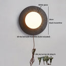 Axyaa White Glass Ball LED Wall Sconce Black Travertine Light Fixture