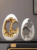 Axyaa Luxury Gold & Silver Egg Decorations: Modern, High-End Décor for Living Rooms & Offices.