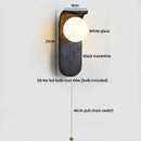 Axyaa White Glass Ball LED Wall Sconce Black Travertine Light Fixture