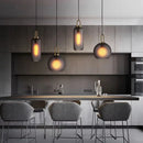 Axyaa Smoke Grey Glass Globe Pendant Light for Industrial Style Living Spaces