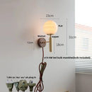 Axyaa Globe White Glass LED Wall Sconce Copper Base Mirror Light