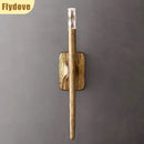 Axyaa Brass Crystal LED Wall Lamp for Home Decor.