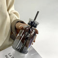 Axyaa Large Glass Water Bottle with Straw, 2 Lids, Clear, Leakproof, Kawaii Eco-Friendly Design