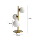 Axya Nordic Glass Ball LED Table Lamp in Gold & Black Iron Art