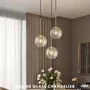 Axyaa Clear Glass Globe LED Pendant Chandelier - Modern Metal Hanging Light for Dining Room