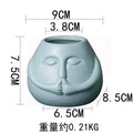 Ceramic Human Face Flowerpot by Axyaa