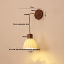 Axyaa Adjustable LED Wall Light Fixture with Ceramic Wood Base