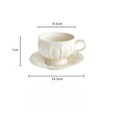 Axyaa Ceramic Gold Painted Tea Cup Set glamorizes afternoon tea styling