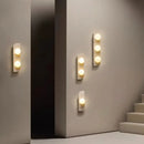 Modern Travertine Stone Wall Sconce Light with Glass Ball for Bedroom Living Room by Axyaa